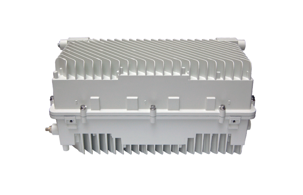 White rectangular electronic equipment housing with ribbed heat sink fins on top and bottom.