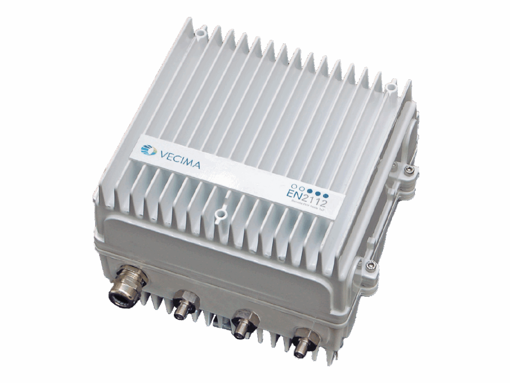 White Vecima EN312 telecommunications equipment unit with heat sink fins and multiple connector